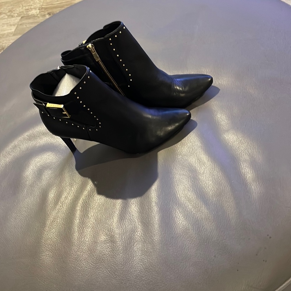 Ladies black leather boots with gold studs. So cute!!